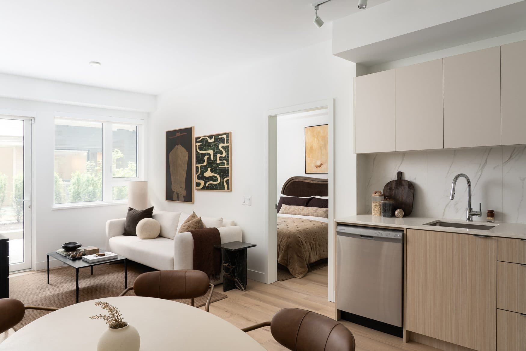 Living area, bedroom and kitchen in a Westward home