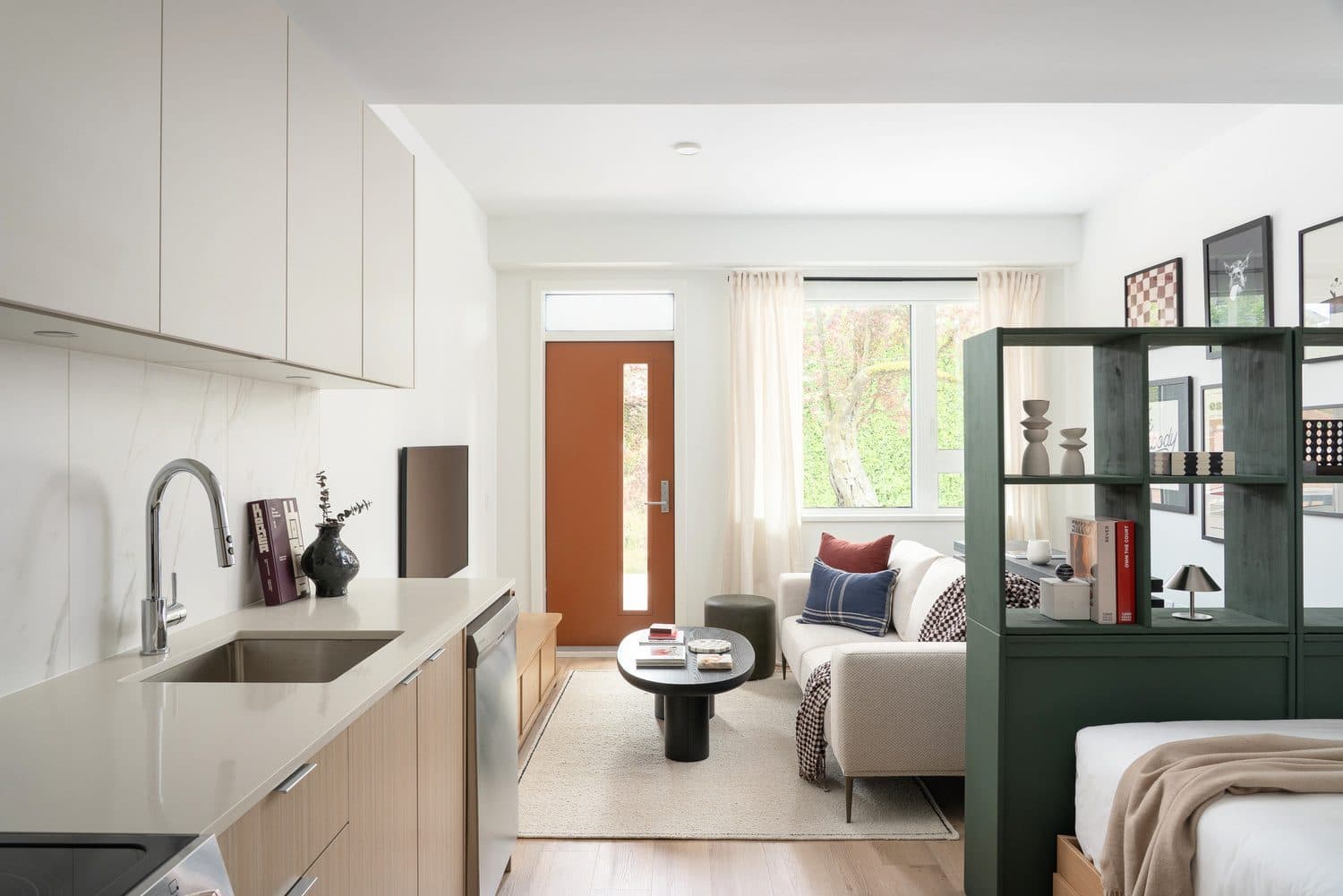 A Westward interior — galley kitchen opening onto the living area